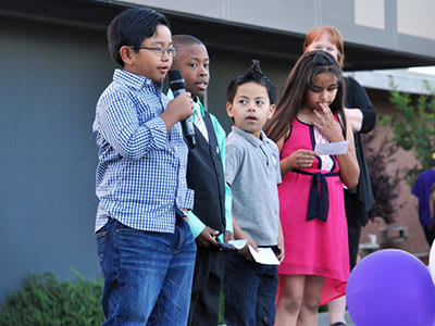 A child holding a microphone