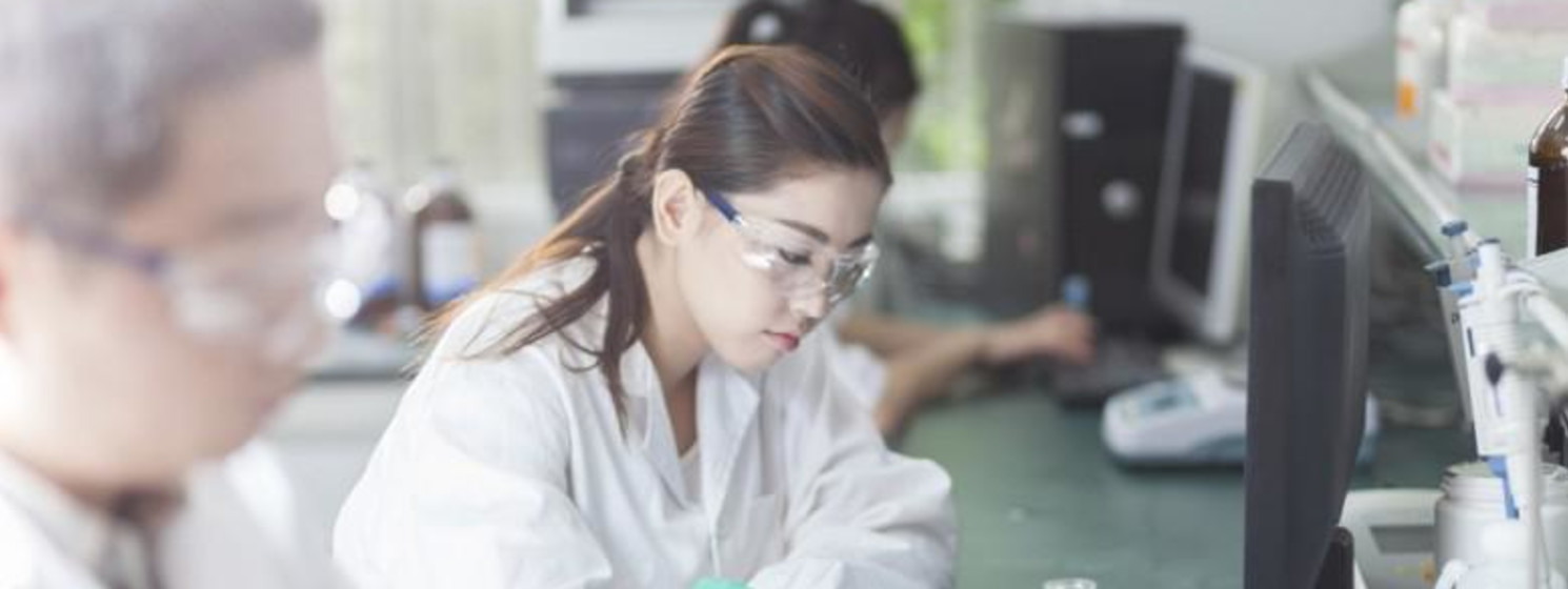 scientists experimenting in a lab