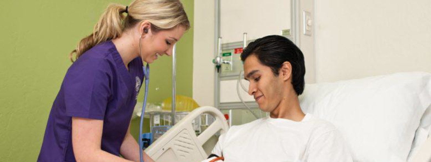 Nurse helping patient