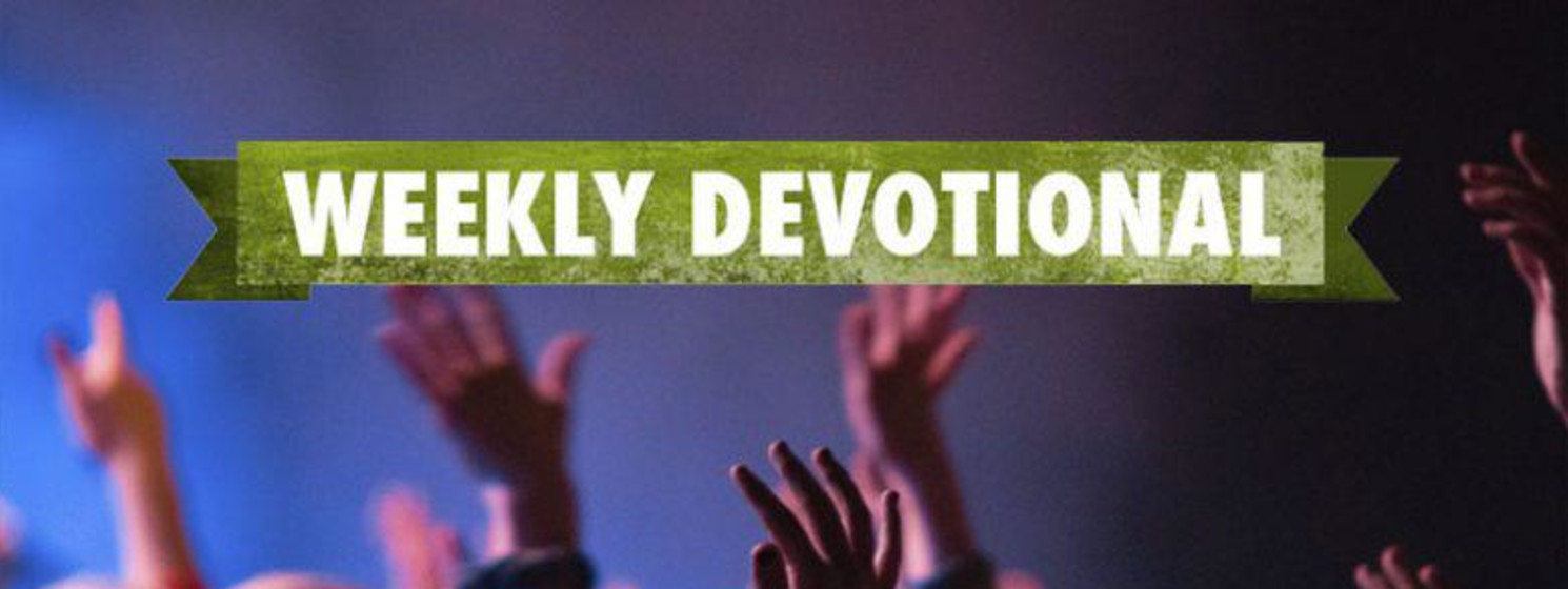 Weekly Devotional: Group of people with their hands in the air