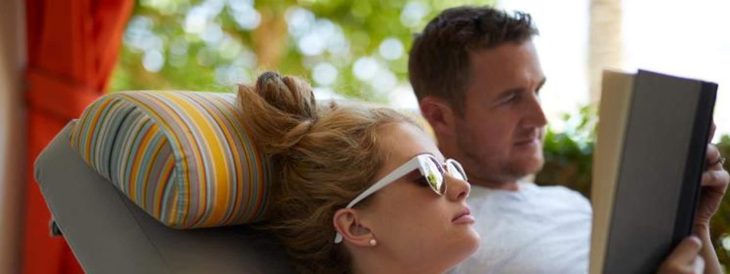 boyfriend and girlfriend reading a book