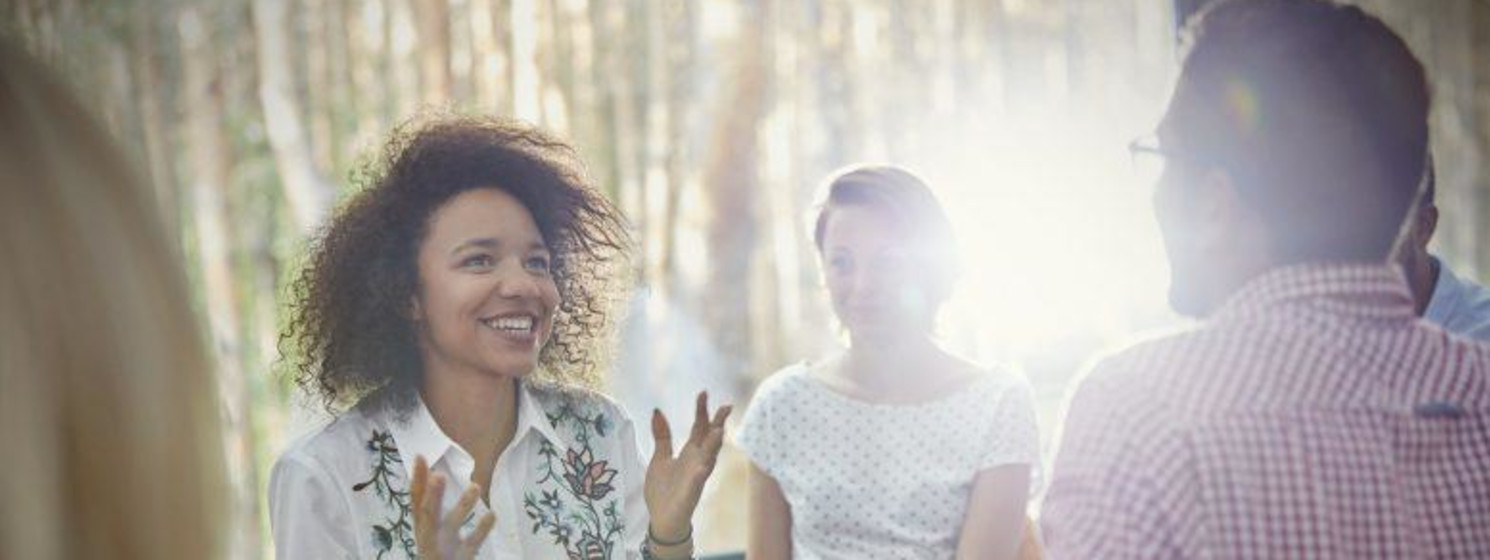 Women talking to others outside