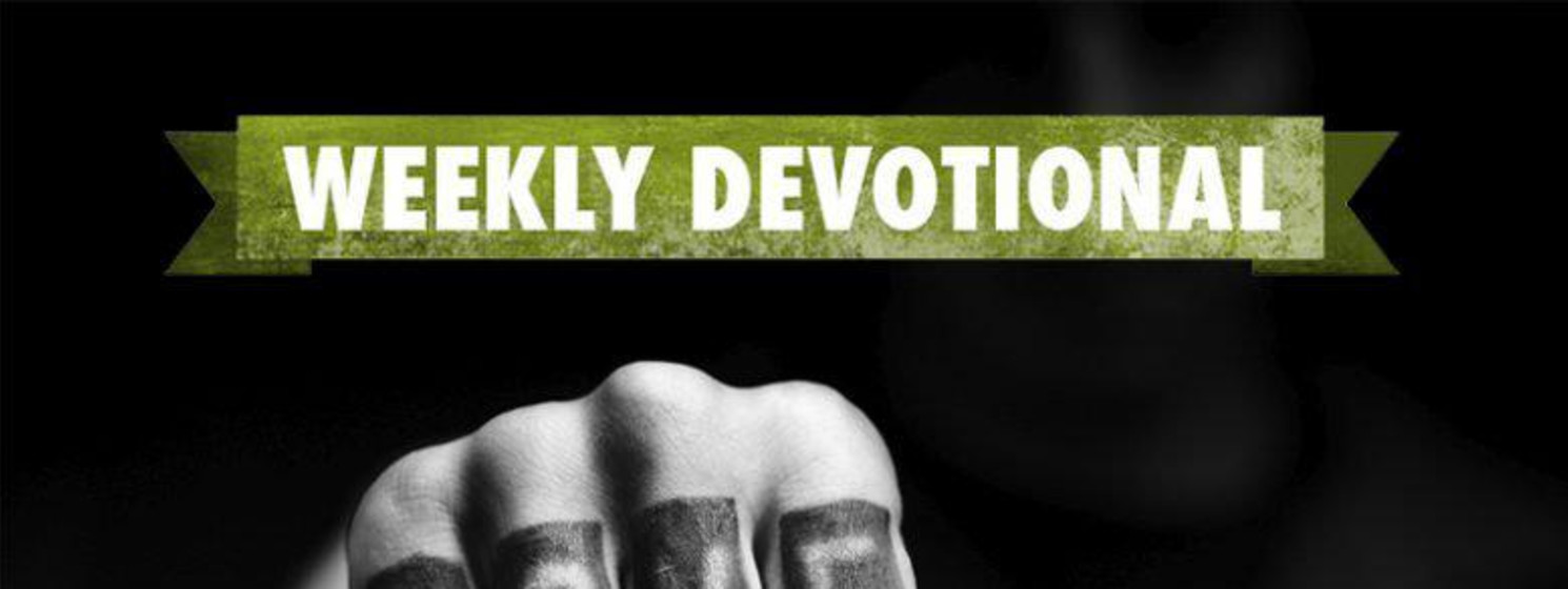 Weekly Devotional: Black and White fist with word love