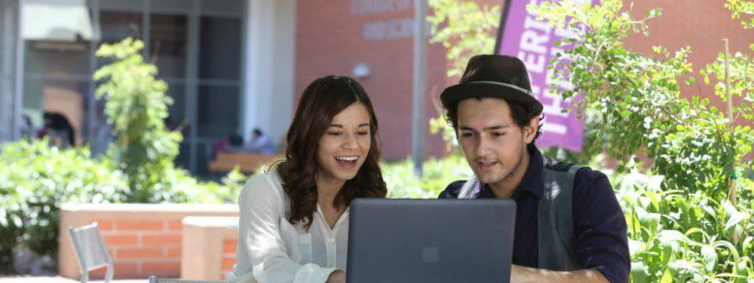 GCU students working together on campus