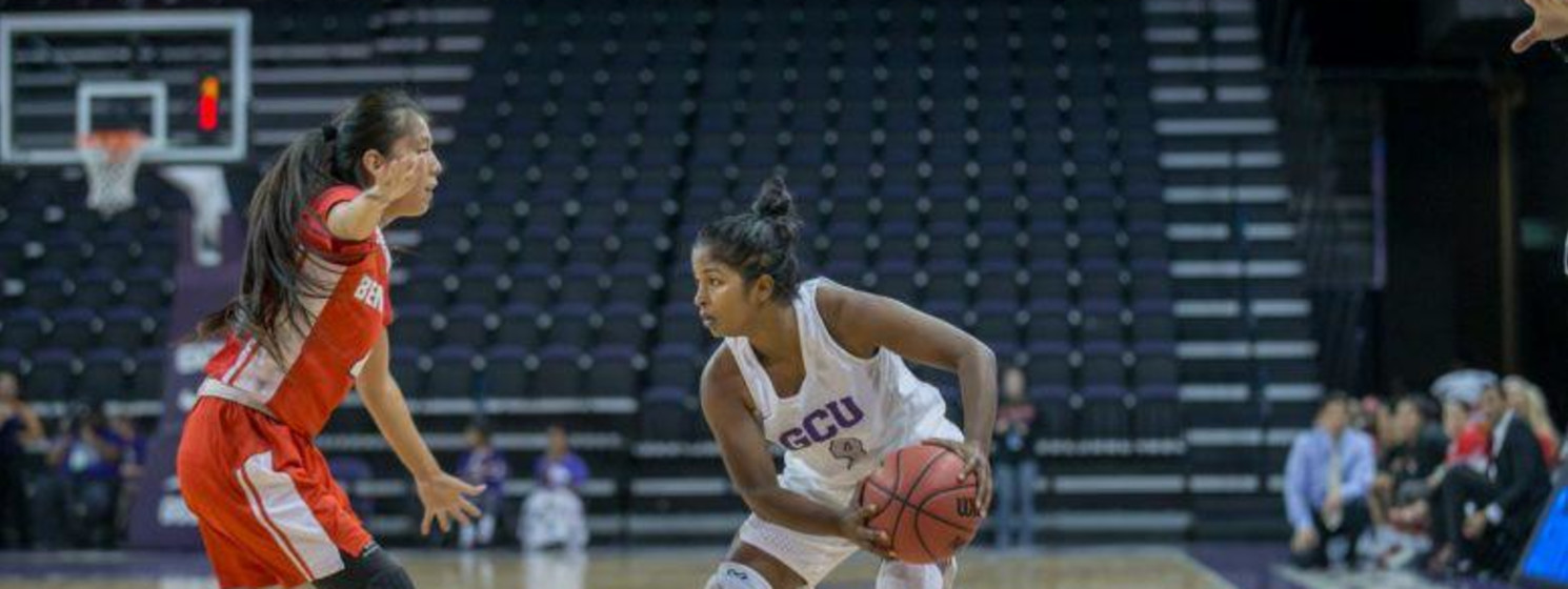 GCU student playing basketball