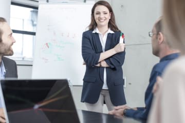 Businesswoman leading a presentation on a meeting