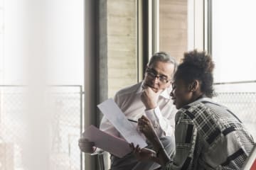 An education intern learning from their mentor
