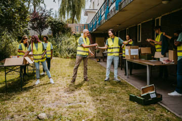 Nonprofit management degree students volunteering in community project