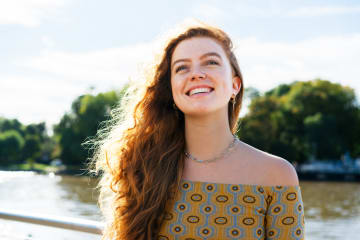 Young woman outside enjoying spring