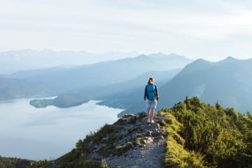 person hiking on mountain