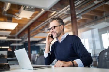 Businessman talking on the phone in an office