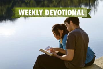 A pair of students under the Weekly Devotional banner