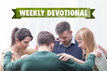 group of people praying