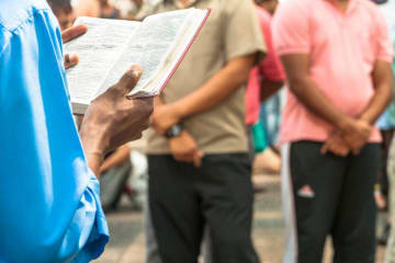 A person preaching in the street