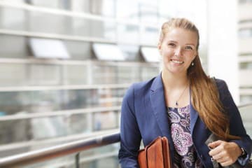 business woman carrying briefcase