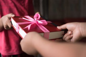 Woman receiving a present