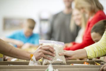 People in line for emergency food boxes
