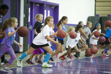 kids playing with basketballs