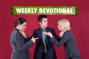 person breaking up a fight