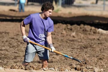 GCU Student doing yard work