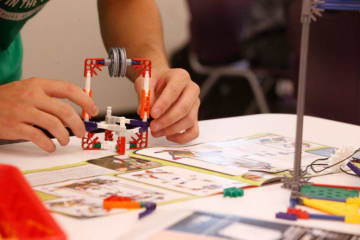 stem student building a prototype