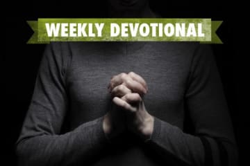 Praying hands under the Weekly Devotional banner