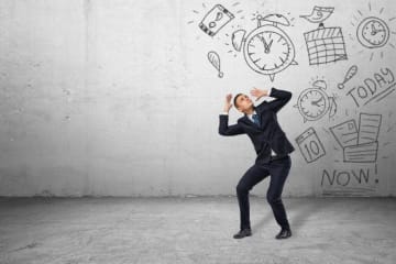 A man overwhelmed by obligations