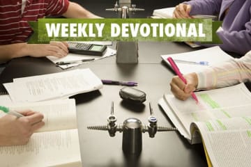 A group of students studying under the Weekly Devotional banner