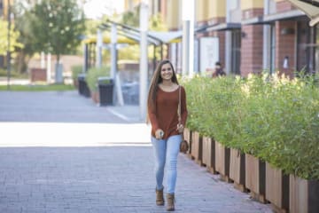 Tatum walking down Lopes Way