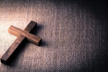 A wooden cross on the floor