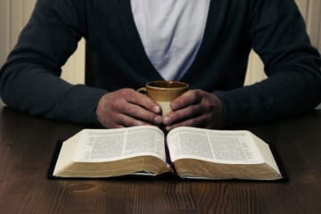 A student reading the Bible