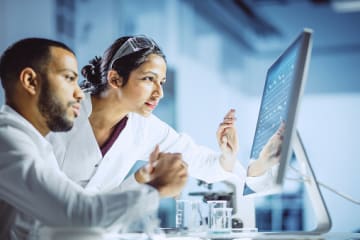 Chemists analyzing samples in a laboratory