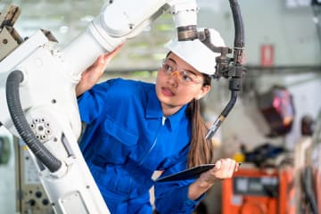 Engineer double-checks the safety of a machine.