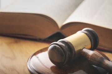 a gavel with an open book