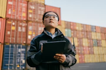 Logistics manager taking inventory