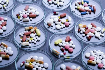 Petri dishes with various pills