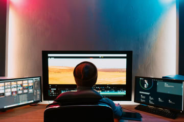 Video editor with film and production degree working on project