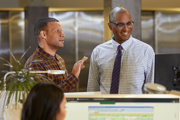 Two men working in an accounting office