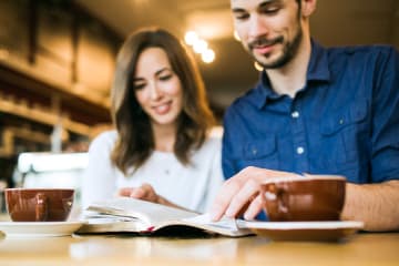 Couple prioritizing God in relationship and studying the bible