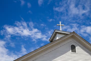 Cross Set Against A Blue Sky