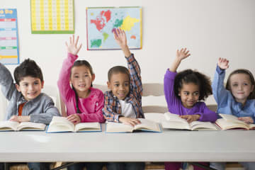 Students reading in the classroom