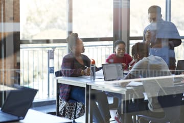 college students doing classwork together