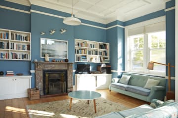 Interior of house with bookshelves and furniture