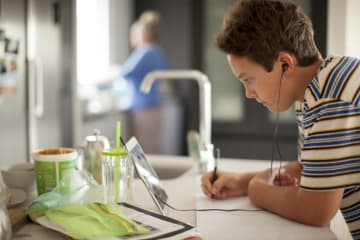 a student doing online schoolwork at home