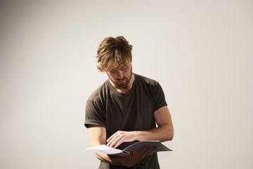 an actor reading a script