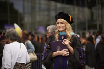 GCU doctoral student with her PhD degree