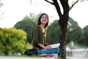 College student studying the Bible