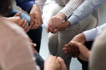 Christians Praying together against oppression