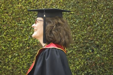 Woman graduating from degree program