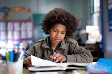 a student reading a book 